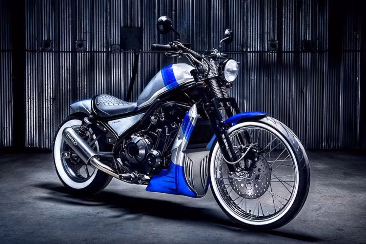 Bản độ môtô Honda Rebel tuyệt vời này được thực hiện bởi xưởng Origin8or Custom Cycles của Rob Chappell ở Canada. Honda Canada đã trực tiếp đặt hàng để tạo ra một bản độ Rebel thế hệ mới để trưng bày ở triển lãm The Motorcycle Show 2018 tổ chức tại Calgary. 