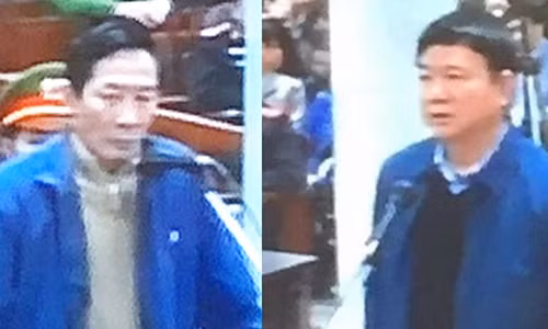 Bị cáo Vũ Hồng Chương và bị cáo Đinh La Thăng tại tòa.