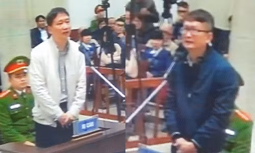 Hai bị cáo Trịnh Xuân Thanh và Đinh Mạnh Thắng tại phiên tòa xét xử.