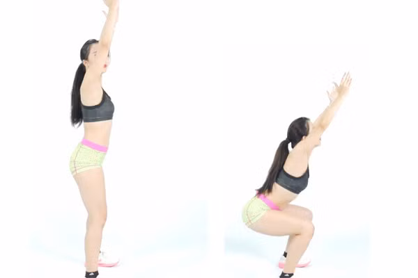  Động tác 4: Đứng thẳng, chân mở 60cm, hai tay giơ cao hết cỡ, lấy 2 chân làm trụ, hạ cơ thể xuống tấn, thân trên giữ thẳng.