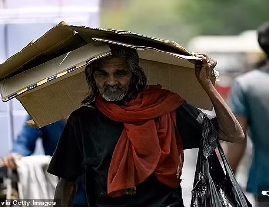 Canh nguoi dan quay cuong trong nang nong o Chau A-Hinh-4