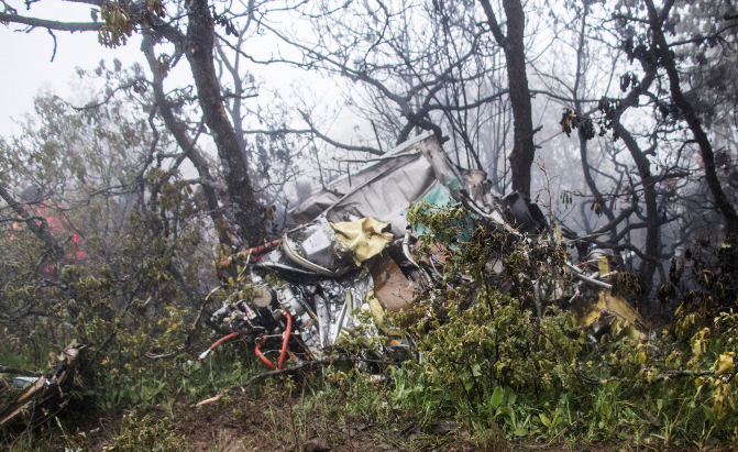 Báo cáo điều tra đầu tiên vụ rơi trực thăng chở Tổng thống Iran Bao cao dieu tra dau tien vu roi truc thang cho Tong thong Iran