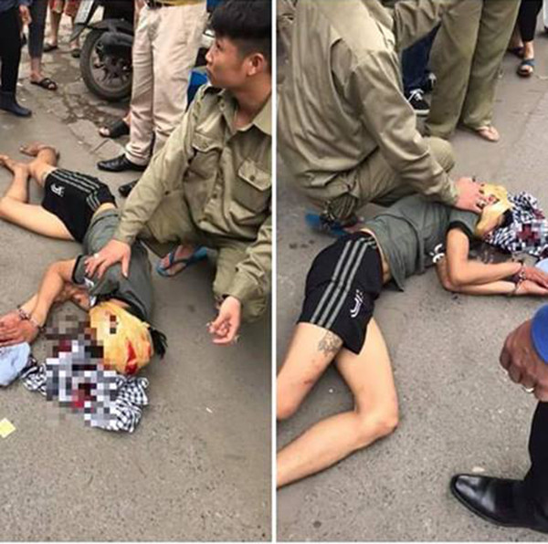 Hot hoang thanh nien cam bua tu dap vao dau giua duong Ha Noi