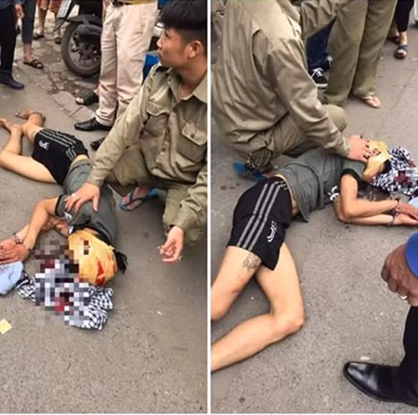 Hot hoang thanh nien cam bua tu dap vao dau giua duong Ha Noi