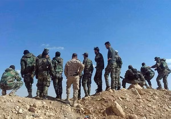 Các binh sĩ Syria tại khu vực mới giải phóng ở Hama. Ảnh: FNA.