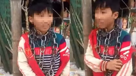 Bé N. bị chú ruột dùng xích quấn quanh cổ.