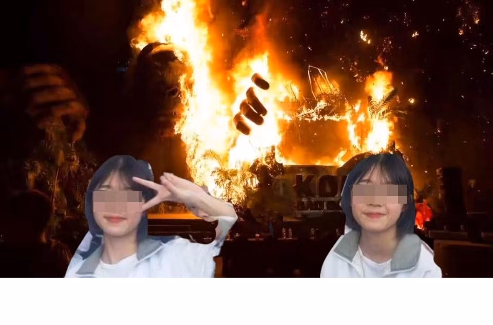 Đám cháy trong buổi công chiếu phim bom tấn Kong tại Sài Gòn cũng trở thành khung cảnh nền cho cô gái tạo dáng. Ảnh: FB Thuyết Lươn.