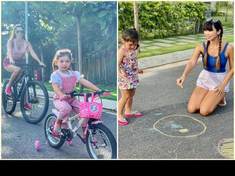 Vợ chồng Hà Anh đưa con gái đi đạp xe, chơi trò chơi dân gian.