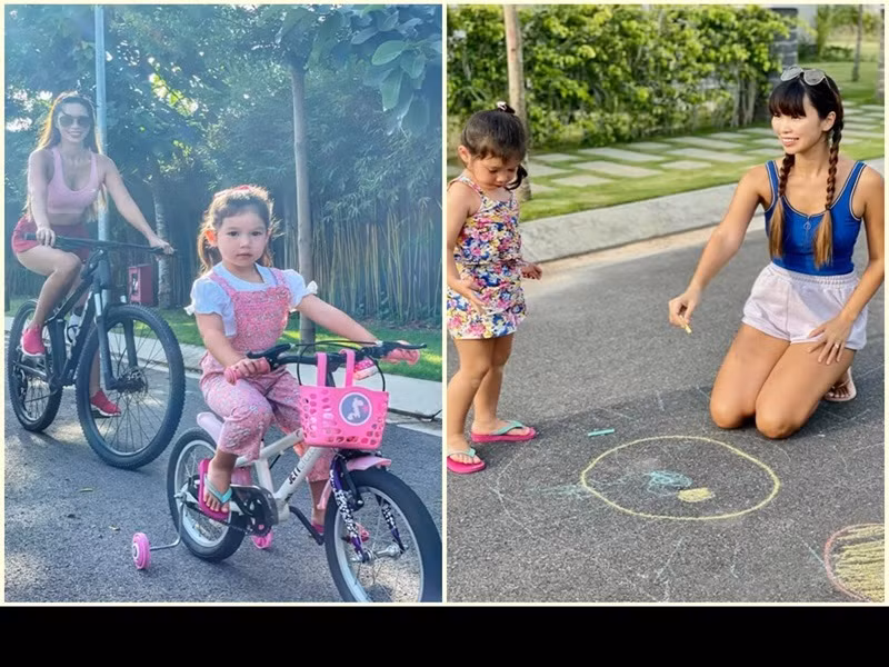 Vợ chồng Hà Anh đưa con gái đi đạp xe, chơi trò chơi dân gian.