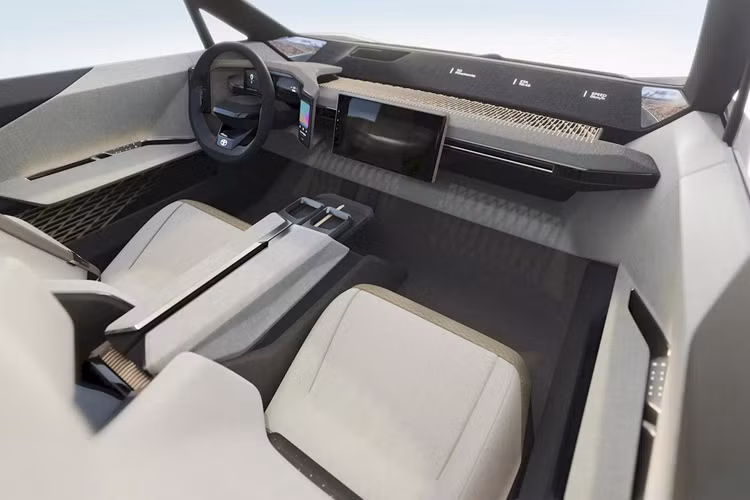 Màn hình cảm ứng cỡ lớn dành cho hệ thống thông tin – giải trí và nhiều chức năng quan trọng của chiếc SUV thuần điện này được đặt lệch sang phía hành khách. Bảng táp-lô và tấm ốp cánh cửa với lớp vải bọc mịn cùng những mảng trang trí đan xen độc đáo.