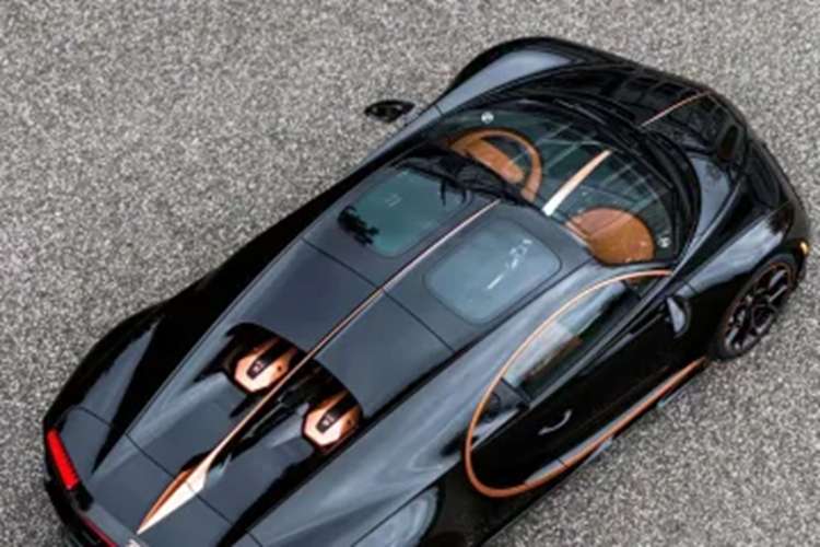 Chiếc siêu xe Bugatti Chiron với khối động cơ mạnh mẽ 1.500 ps cuối cùng rời khỏi Molsheim Atelier có sự pha trộn quyến rũ giữa điểm nhấn là màu Nocturne và Copper