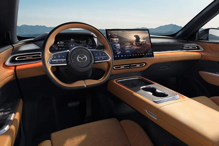 Thiết kế Mazda EZ-6 vẫn tuân theo ngôn ngữ thiết kế Kodo đặc trưng của Mazda nhưng được tinh chỉnh để phù hợp hơn với các đặc trưng của xe điện. Bên trong cabin, Mazda EZ-6 sở hữu không gian nội thất hiện đại, tập trung vào sự thoải mái và công nghệ.