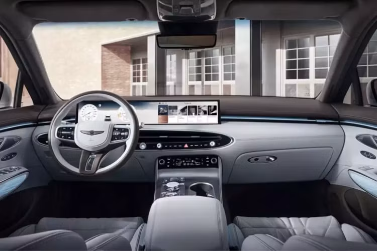 Đây là sự kết hợp giữa bảng đồng hồ kỹ thuật số và màn hình cảm ứng trung tâm, tương tự các mẫu xe đời mới khác mang thương hiệu Hyundai và Kia. Điểm chung tiếp theo giữa 2 mẫu xe này là vô lăng mới. Ngoài ra, Genesis GV70 2025 còn được trang bị màn hình chỉnh điều hòa hình chữ nhật đơn giản hơn trước trong khi cửa gió điều hòa được thiết kế hình elip.