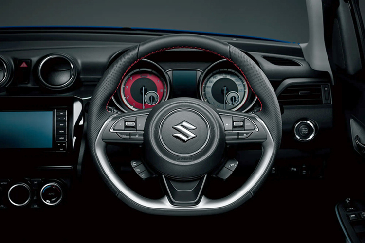 Hãng cũng tăng tính thể thao xe xe bằng cách thay đổi chất liệu trang trí vô lăng từ màu đen bóng sang màu bạc. Các trang bị khác tương tự như Swift Sport tiêu chuẩn, như ghế trước thể thao với bọc ghế nổi bật cùng chỉ khâu đỏ.