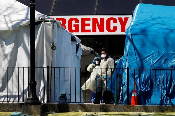 So ca nhiem Covid-19 o My vuot 100.000, TT Trump huy dong 1 trieu linh du bi