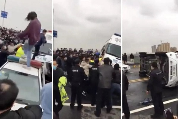 Dung do canh sat, nguoi dan do tranh cai go phong toa o Ho Bac