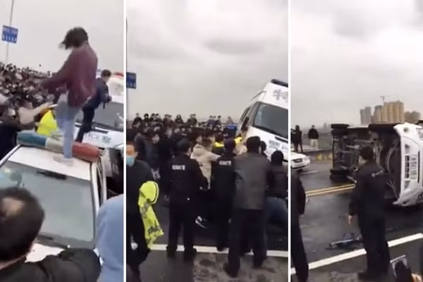 Dung do canh sat, nguoi dan do tranh cai go phong toa o Ho Bac