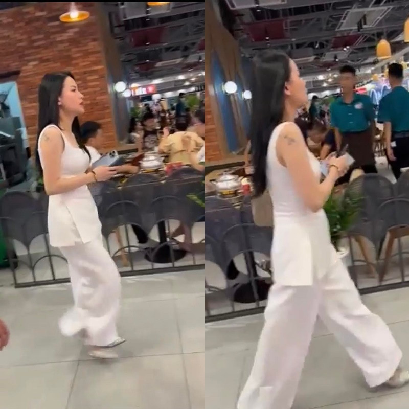 Mới đây, những hình ảnh Hà Linh bị người qua đường vô tình chụp được khi cô có mặt tại một trung tâm thương mại đã gây được sự chú ý lớn. Theo đó, nữ TikToker diện một bộ trang phục màu trắng, tóc đen dài để xõa và đang gọi điện cho ai đó.