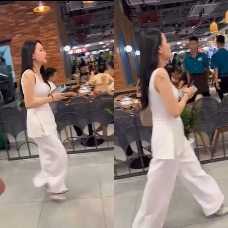 Mới đây, những hình ảnh Hà Linh bị người qua đường vô tình chụp được khi cô có mặt tại một trung tâm thương mại đã gây được sự chú ý lớn. Theo đó, nữ TikToker diện một bộ trang phục màu trắng, tóc đen dài để xõa và đang gọi điện cho ai đó.