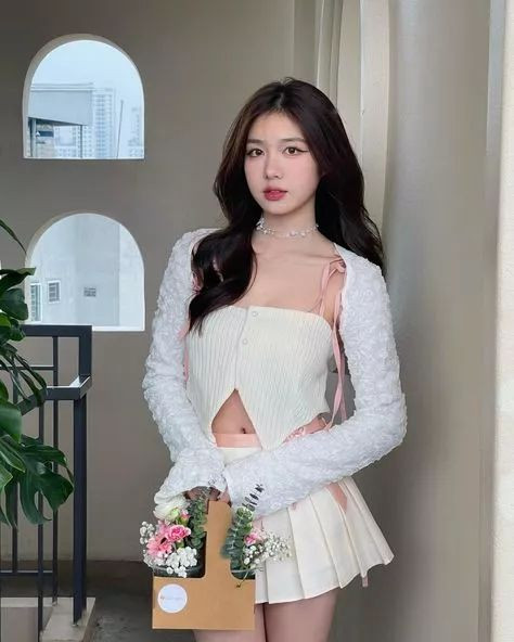 Cô nàng theo đuổi phong cách nữ tính ngọt ngào.