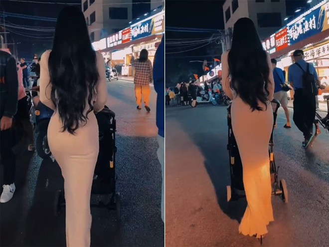 Thân hình có phần xồ xề, không được gọn gàng là điều dễ hiểu ở những người phụ nữ mới sinh con, thế nhưng dáng dấp yêu kiều với mái tóc bồng bềnh như thiếu nữ thế này khiến rất nhiều người đi đường không khỏi ngoái lại.