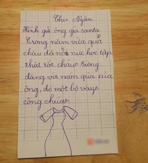 Mong muốn nhận được một chiếc váy đúng ý trong dịp Noel, cô bé cẩn thận vẽ luôn hình minh hoạ để khỏi nhầm lẫn.