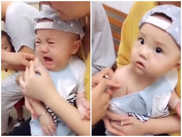 Em bé này thì trái ngược lại, cứ nghĩ tiêm là ghê gớm lắm nhưng đến khi tiêm xong lại tỉnh bơ, hóa ra tiêm không đáng sợ như tưởng tượng.