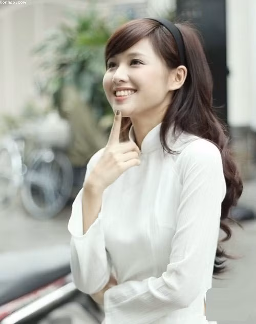 Vẻ trong sáng cùng nụ cười tỏa nắng này từng đốn tim rất nhiều nam thanh niên thời ấy.