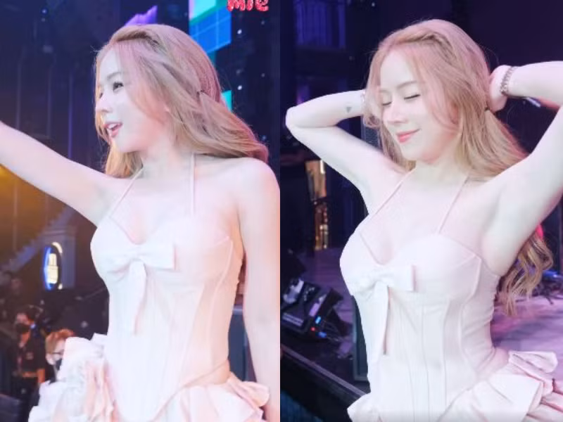 Nữ DJ xinh đẹp diện bộ váy ôm sát màu hồng phấn. Cô nhún nhảy theo nhạc và hòa cùng không khí sôi động phía dưới khán giả trong 1 show diễn ở Campuchia.