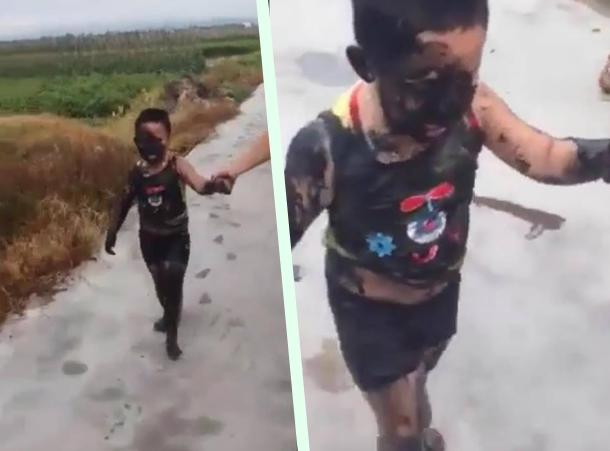 Nghịch ngợm cạnh ruộng lúa, cậu bé này cũng rơi vào trường hợp y hệt. Người lấm lem bùn đất thế này thì về no đòn với mẹ cha.
