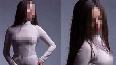 Trong những bức hình đăng tải, cô gái này không ngần ngại khoác lên mình bộ áo dài trắng mỏng tang, khoe vòng 1 và vòng 3 lồ lộ khiến người xem phải đỏ mặt.