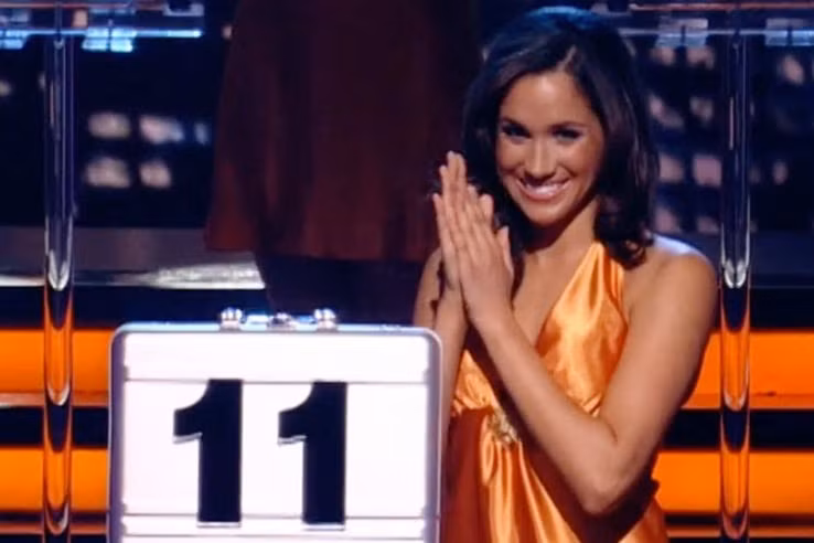 Meghan thường lảng tránh khi được nhắc tới vai trò người mẫu đứng cầm vali trong gameshow “Deal or No Deal”.
