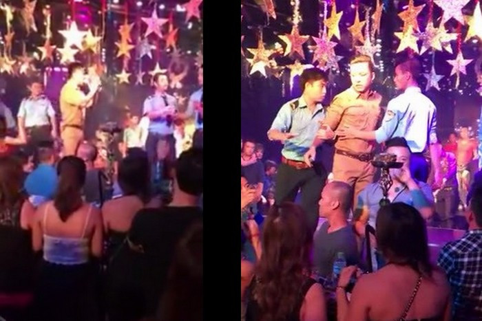 Nam ca sĩ bức xúc khi bị một khán giả ném ly vào người.