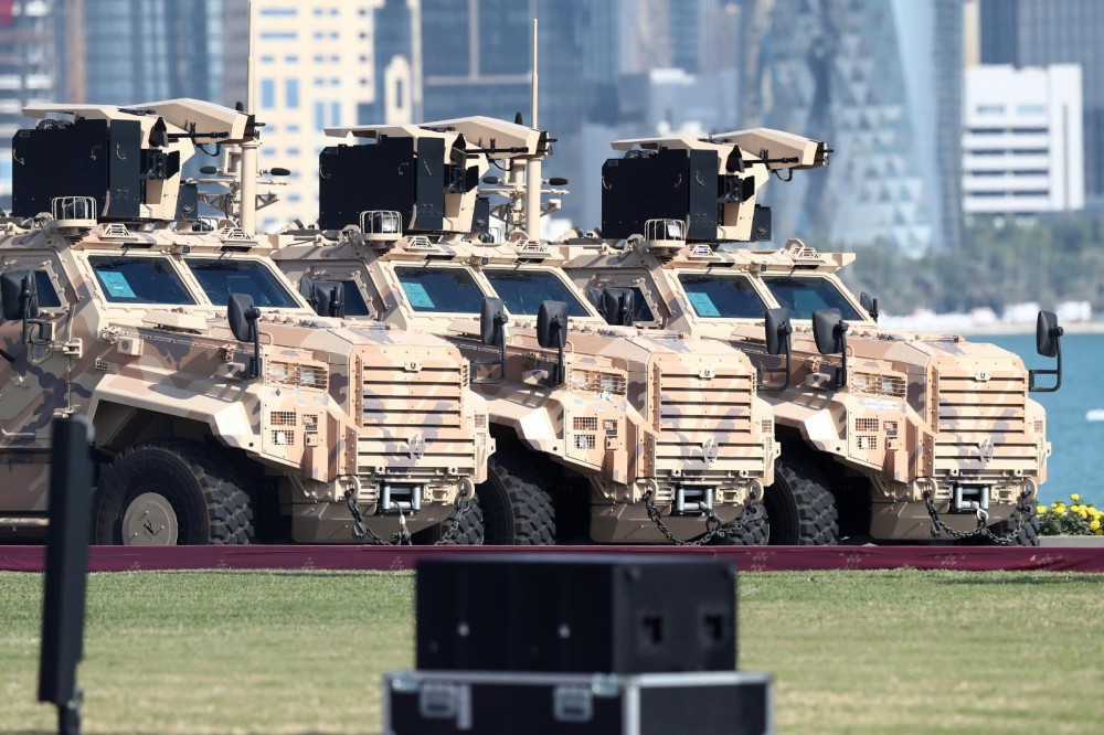 Dàn xe thiết giáp dẫn động bốn bánh Ejder Yalçin được Qatar mua từ Thổ Nhĩ Kỳ xuất hiện trong cuộc duyệt binh mừng Quốc khánh của nước này hôm cuối tuần vừa rồi. Nguồn ảnh: BMDP.