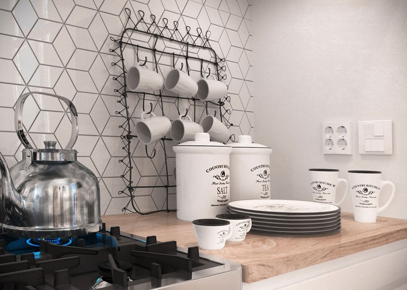 Cốc bằng gốm được treo trên một chiếc giá có hình thù dễ thương.