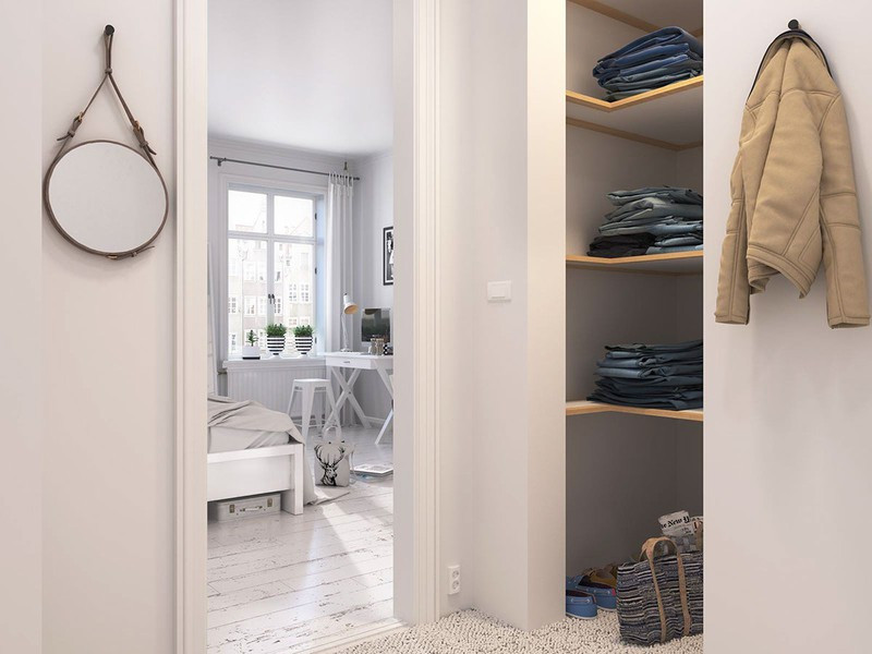 Tủ quần áo âm tường đặt gọn gàng phía trong phòng ngủ.