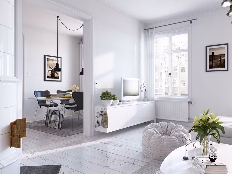 Một phòng ăn nhỏ đặt giữa phòng khách và nhà bếp. Nó đủ riêng tư để không bị tiếng ồn từ phòng khách ảnh hưởng nhưng vẫn đủ thoáng để có thể quan sát khắp ngôi nhà.