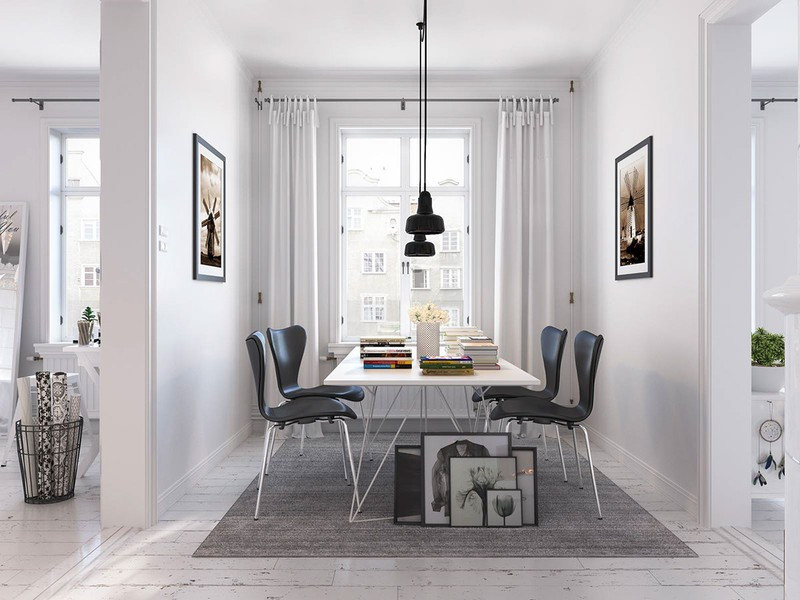 Đèn và ghế ăn màu đen tạo điểm nhấn xinh xắn cho khu vực ăn uống.