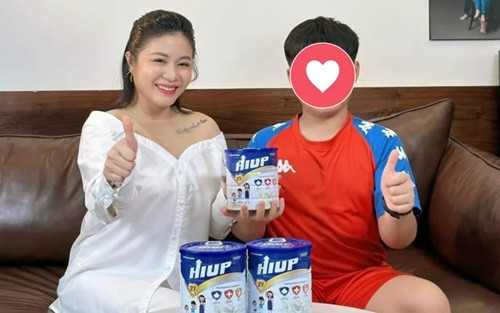 BTV Hoang Linh phan ung ra sao giua on ao quang cao sua gia?-Hinh-2