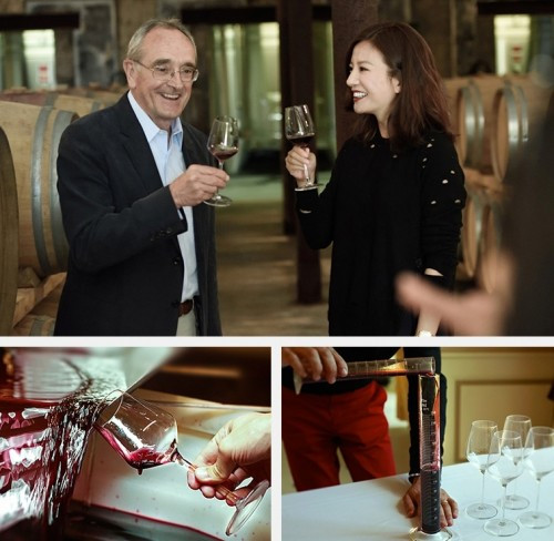 Nữ diễn viên cùng chuyên gia nếm thử rượu vang.
