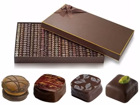 7. Chocolate Michel Cluizel – 895 USD: Loại socola Pháp của hãng Michel Cluizel nổi tiếng thế giới chủ yếu do hương vị riêng biệt. Mỗi hộp có thiết kế đặc biệt, gồm 400 miếng làm thủ công hoàn toàn và xếp ngay ngắn theo hàng lối. Từng miếng là một hương vị khác nhau như mật ong hạt dẻ, quả mâm xôi, crème brulee ganache kết hợp bơ caramel.