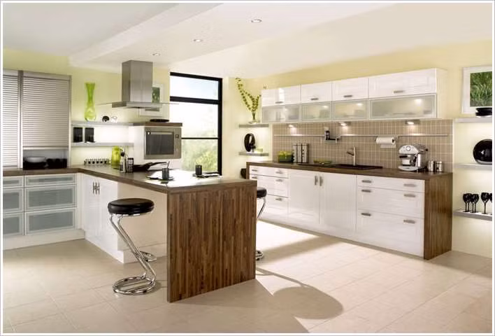 Với không gian bếp lớn, bạn có thể bố trí hai kệ một bên nấu nướng và một bên ngồi nhâm nhi tách trà.