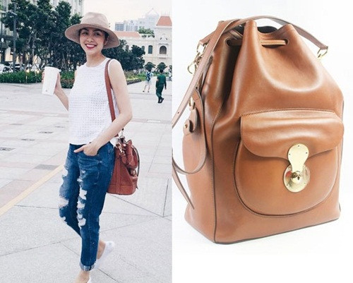 Cô xuống phố với túi xách từ thương hiệu thời trang Ralph Lauren, có tên là Ricky Drawstring. Giá của chiếc túi khoảng 50 triệu đồng.