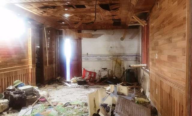 Tầng 1 nhà anh Cường tan hoang sau vụ ném mìn. Nguồn ảnh: Vietnamnet