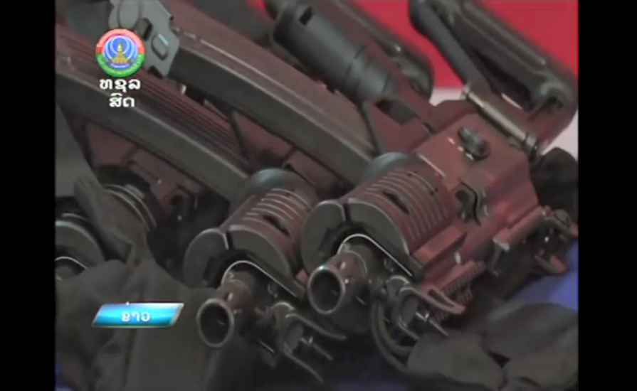 Trước khi xuất thiện tại lễ duyệt binh của Lào, súng trường Galil ACE cũng đã được Viêt Nam giới thiệu tại triển lãm quốc phòng quốc tế Indodefense diễn ra tại Indonesia với những cái tên khác gồm STV 215 và STV 380. Nguồn ảnh: Lao National Television.