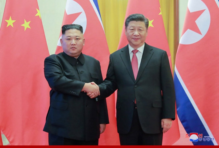 Chủ tịch Trung Quốc Tập Cận Bình và Nhà lãnh đạo Triều Tiên Kim Jong-un.