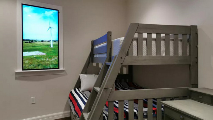 Các khung cửa sổ kỹ thuật số kết nối với một camera cho phép người ở trong nhà có thể quan sát được khung cảnh bên ngoài.