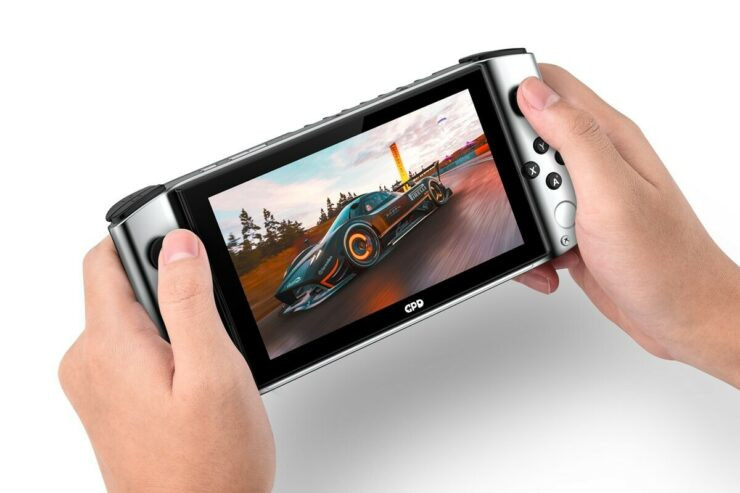 Ngoài việc chơi game trên màn hình 5,5 inch, người dùng có thể cắm GPD Win 3 lên dock mở rộng, gồm cổng HDMI để kết nối màn hình ngoài, cổng mạng Ethernet, USB-C và 3 cổng USB-A.