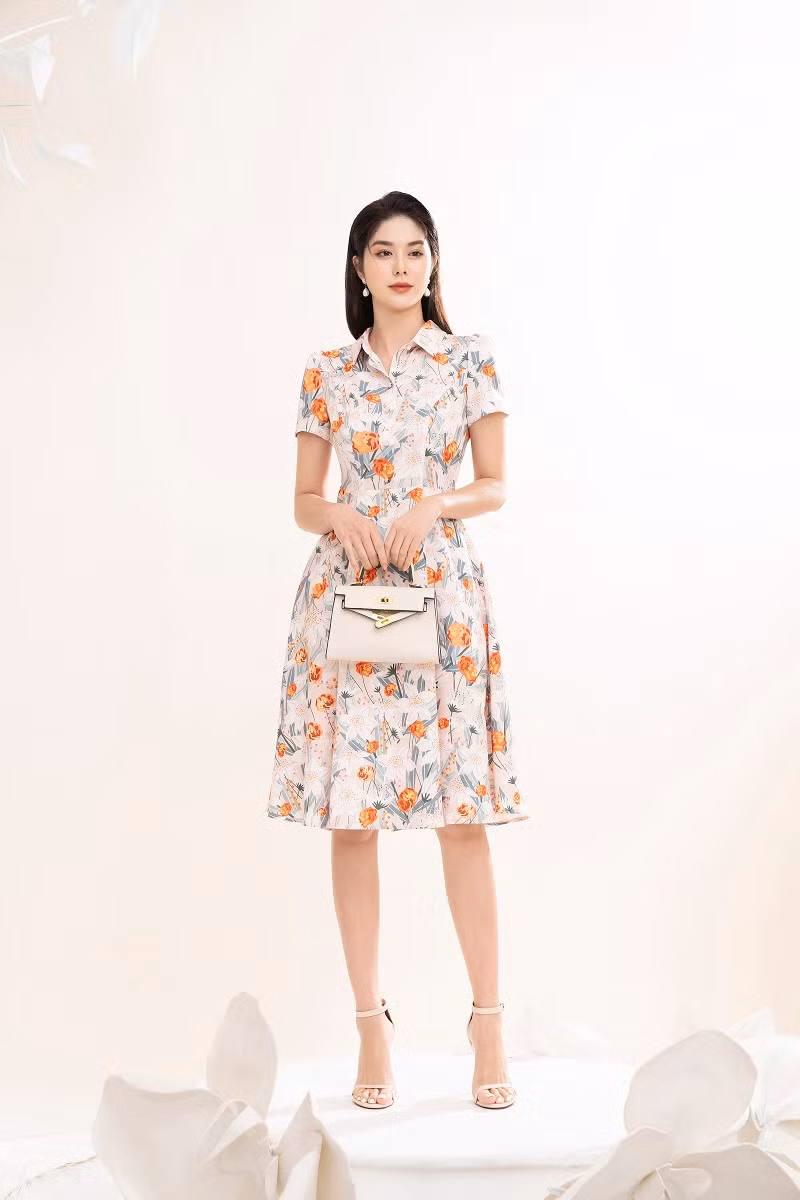 Lan Ngọc trong một thiết kế đầm xoè thướt tha điệu đà.