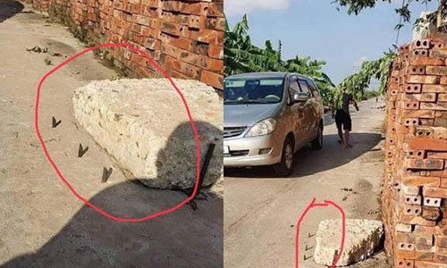 Dan cam chong sat quanh cuc be tong khien nhieu o to xit lop